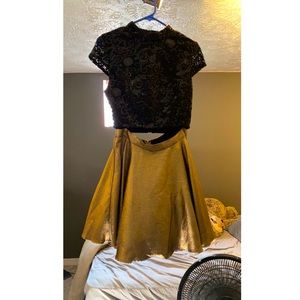 Two piece black and gold dress.